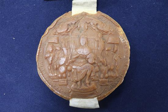 Two Charles II wax seals, one with a Latin manuscript indenture on vellum,